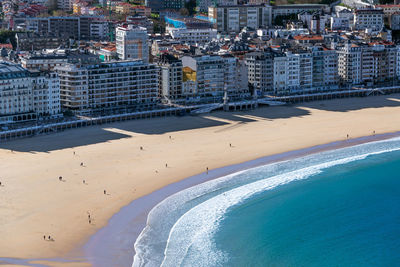 High angle view of beach by buildings in city