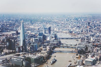 Aerial view of cityscape against sky