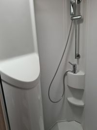 High angle view of electric lamp on wall at home