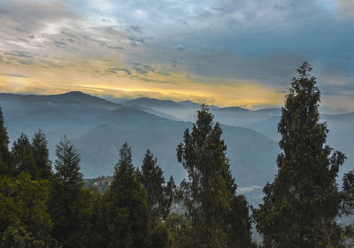 Scenic view of mountains against sky during sunset