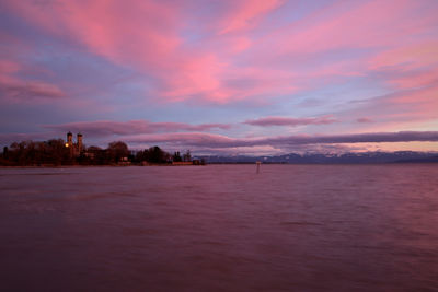 Scenic view of sea against sky at sunset