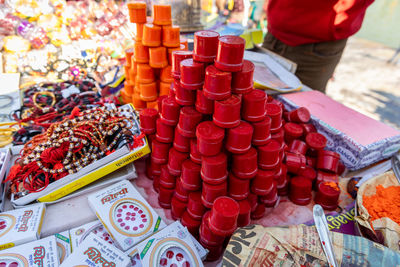 Hindu holy vermilion kept for selling at street shop at morning