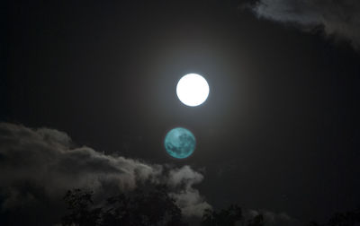 Low angle view of moon in sky