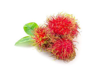 Close-up of strawberry against white background