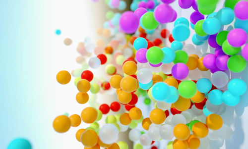 Low angle view of balloons against sky