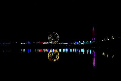 Bridge over river at night