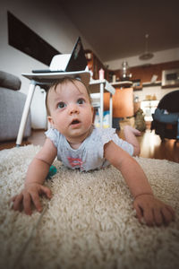 Portrait of cute baby at home