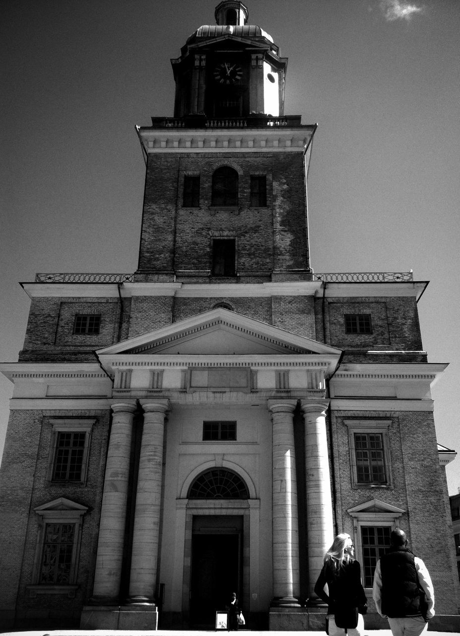 architecture, built structure, building exterior, lifestyles, men, low angle view, sky, person, history, famous place, leisure activity, place of worship, travel destinations, tourism, tourist, religion, travel, church