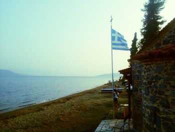 Scenic view of calm sea against clear sky