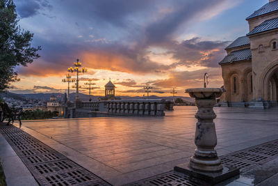 Panoramic view of buildings against sky during sunset