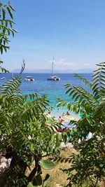 Scenic view of sea against blue sky