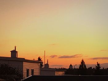 City against sky during sunset