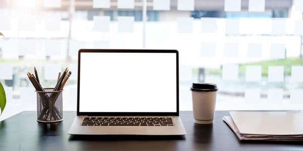 Close-up of laptop on table