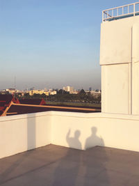 Buildings against clear sky in city