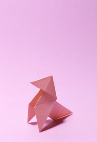 Close-up of paper flag against white background