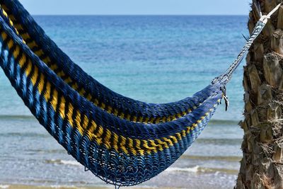 Close-up of rope against sea