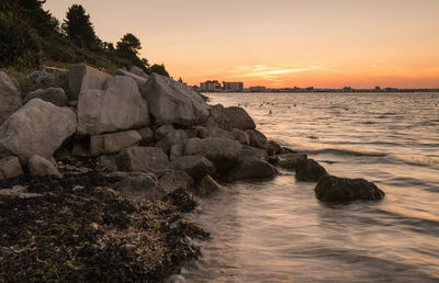 Scenic view of sea against sky during sunset