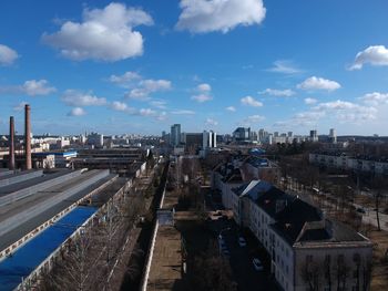 High angle view of buildings in city against sky