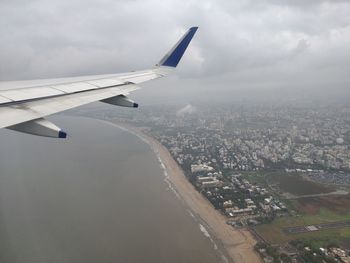 Aerial view of city against sky