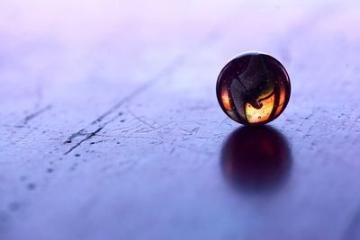 Close-up of marble on table