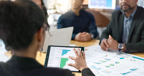 Business colleagues working at office