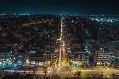 High angle view of illuminated cityscape at night