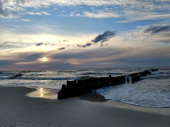 Scenic view of sea against sky during sunset