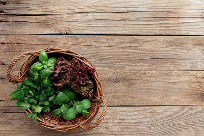 High angle view of vegetables in basket on table