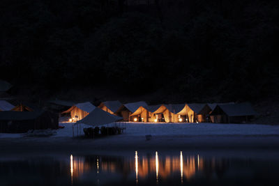 Illuminated water at night