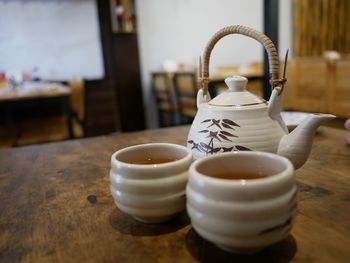 Close-up of coffee cup on table