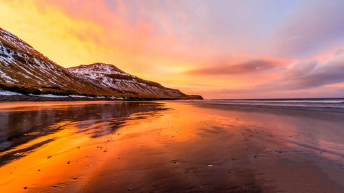 Scenic view of black sand beach