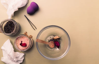 Diy homemade cosmetics. table with randomly arranged ingredients. salt, lavender, sponge, tweezers