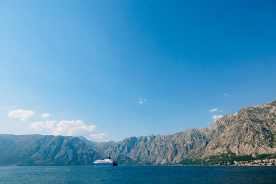 Scenic view of sea against blue sky