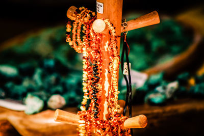 Close-up of cross on wood