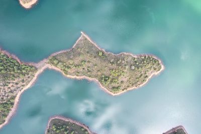 High angle view of island amidst sea