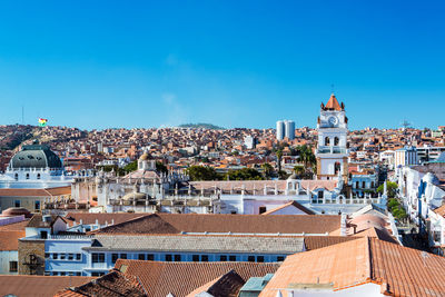 View of cityscape against clear sky