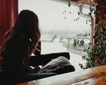 Woman sitting on floor