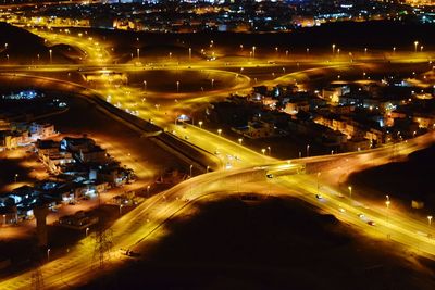 Light trails on road in city at night