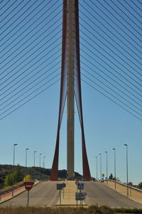 View of suspension bridge against clear sky