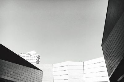 Low angle view of buildings against clear sky