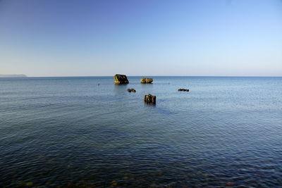 Scenic view of sea against clear sky