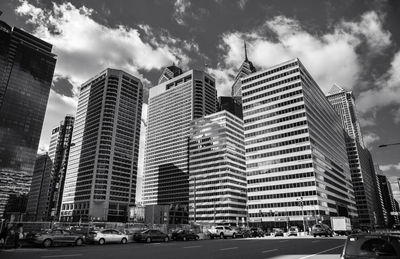 City street against cloudy sky