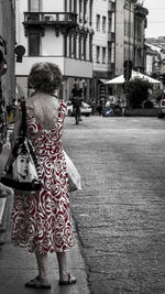 Woman standing in city