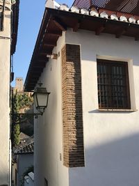 Low angle view of houses against sky