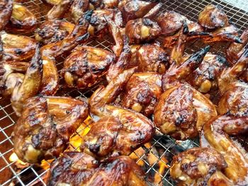 Close-up of meat on barbecue