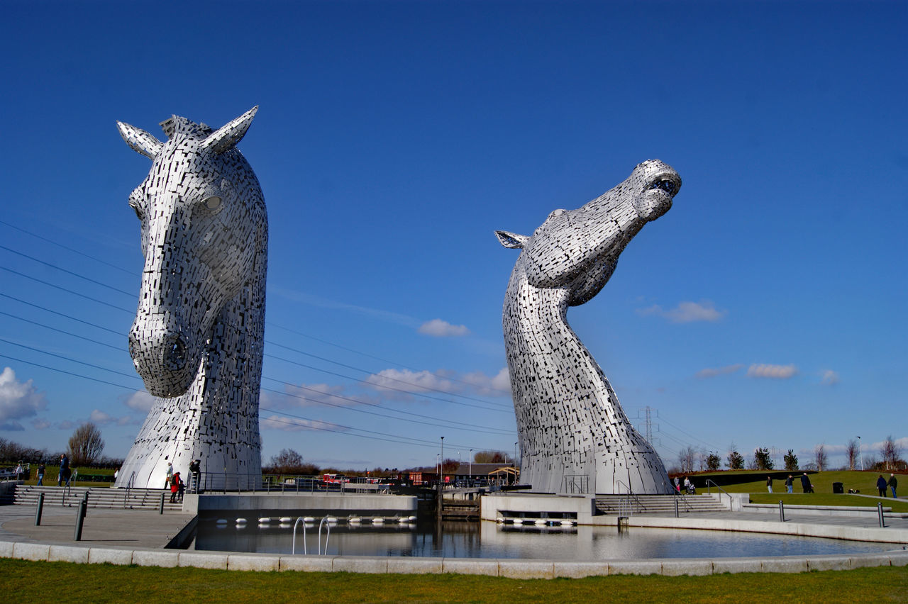 blue, sculpture, statue, sky, no people, outdoors, day, animal themes