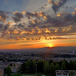 View of cityscape at sunset