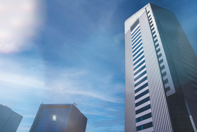 Low angle view of modern building against sky