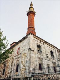 Low angle view of old building against sky