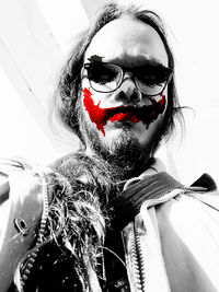 Close-up portrait of a man with sunglasses